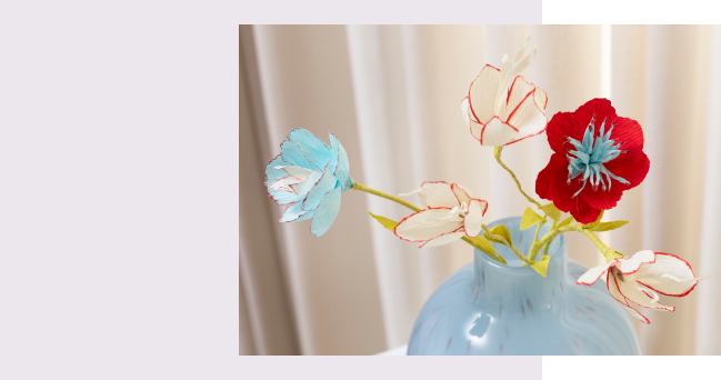 Crêpebloemen in vaas