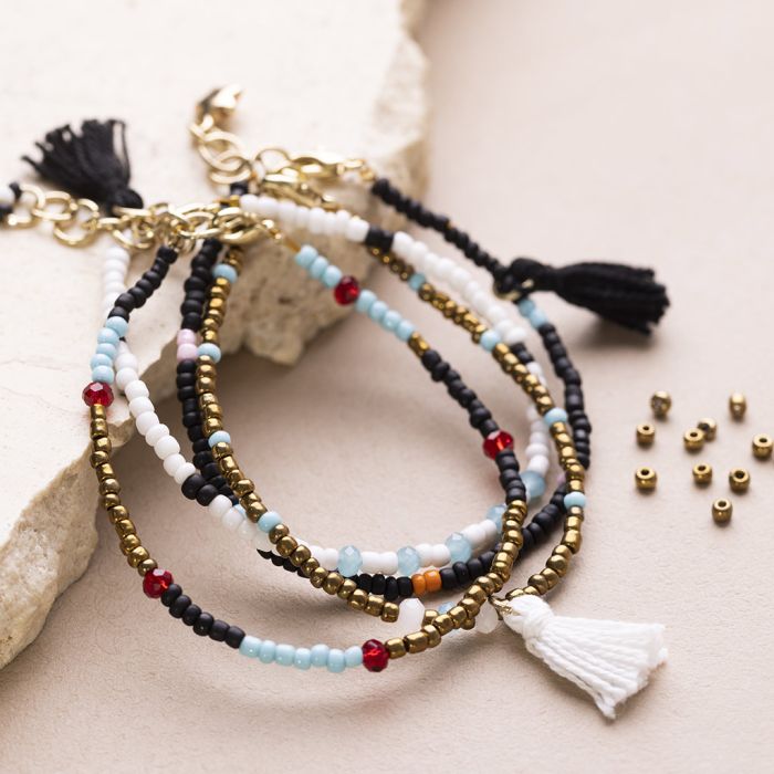 Armband met rocailles, facetkralen en tassels