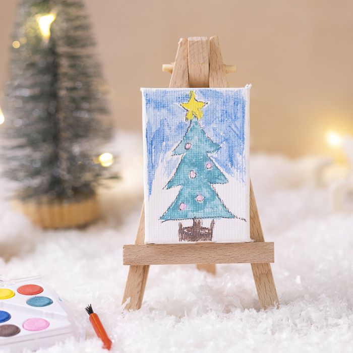 De kabouter doet zich voor als kunstenaar