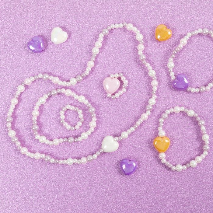 Sieraden met houten kralen en waskralen