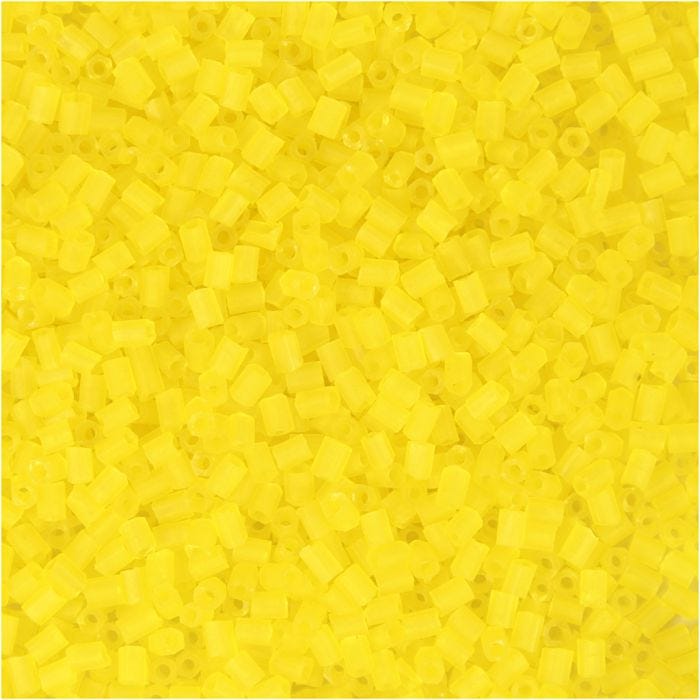 Rocailles 2-cut, d 1,7 mm, afm 15/0, gatgrootte 0,5 mm, transparant geel, 25 gr/ 1 doos