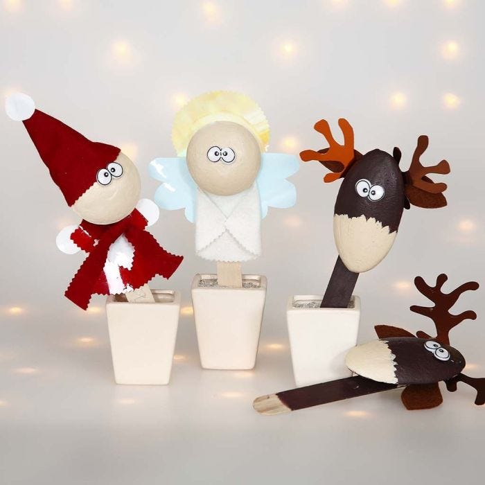 Kerstfiguren op ijsstokjes