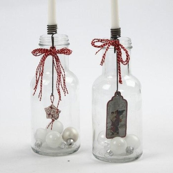 Gedecoreerde kandelaars voor op de kersttafel