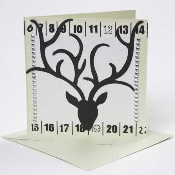 Een wenskaart met strass en masking tape