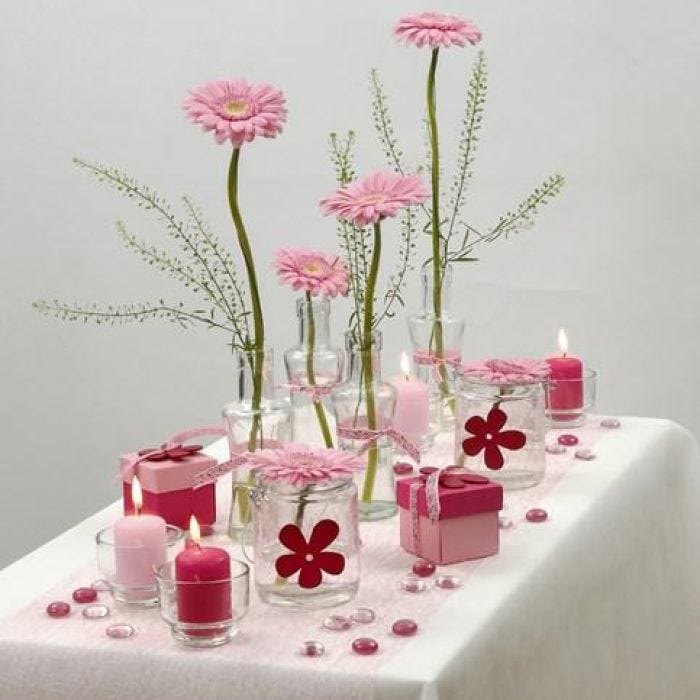 Tafeldecoraties wit met roze: Het is een meisje!