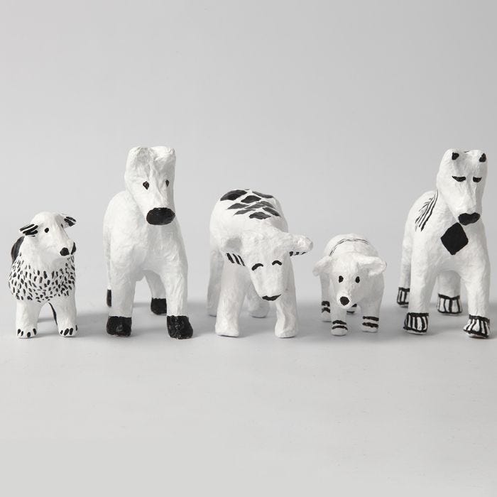 Papier-maché dieren met grafische designs