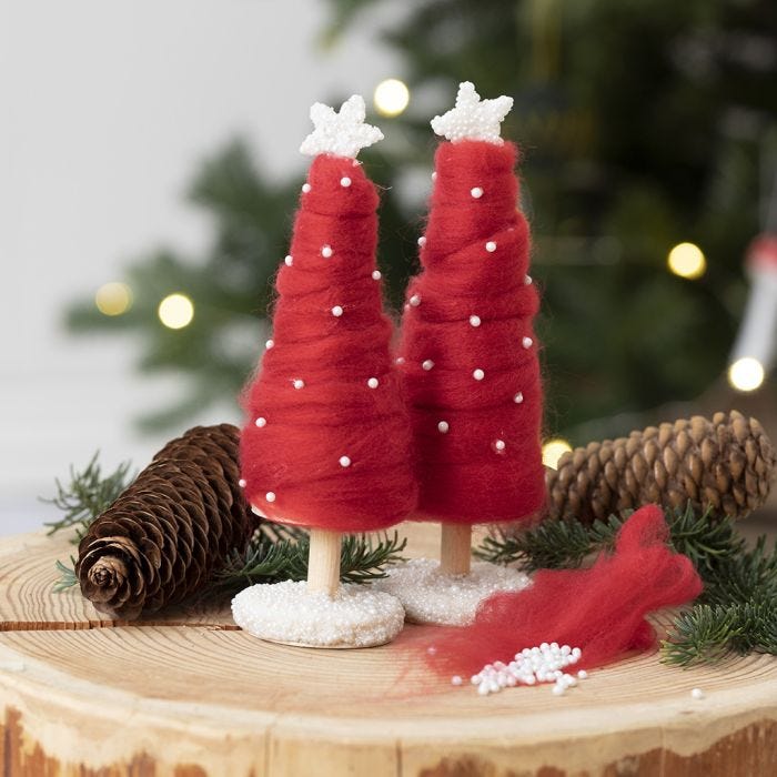 Een kerstboom bedekt met XL dik garen