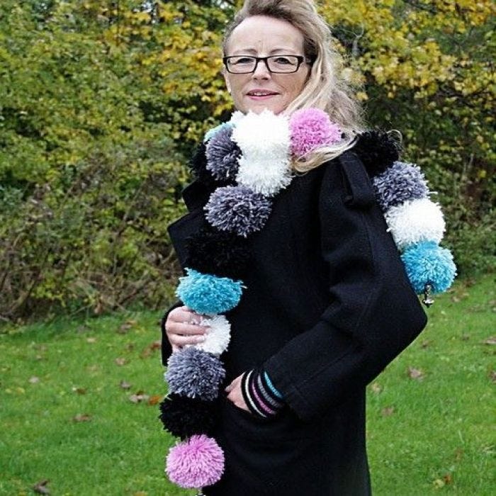 Pom-Pom sjaal en handenwarmers