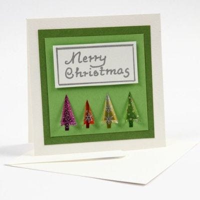 Kerstkaart met 3D kerstbomen