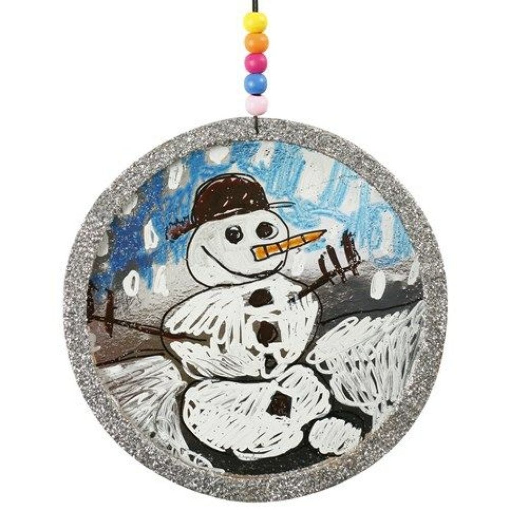 Metallic papier met een tekening in een houten lijst met glitter