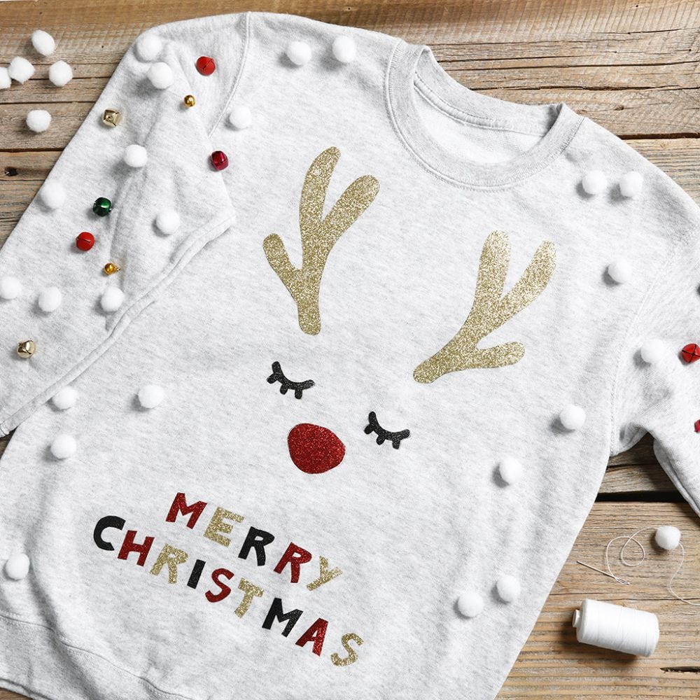 Een grappige kersttrui met jingle bells